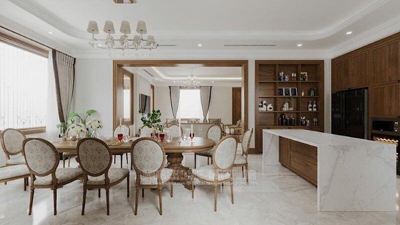 Bàn đảo bếp gỗ óc chó với bề mặt đá nhân tạo màu trắng vân mây cao cấp và độc đáo ốp, sẽ làm nên sự sang trọng cho không gian bếp của bạn.